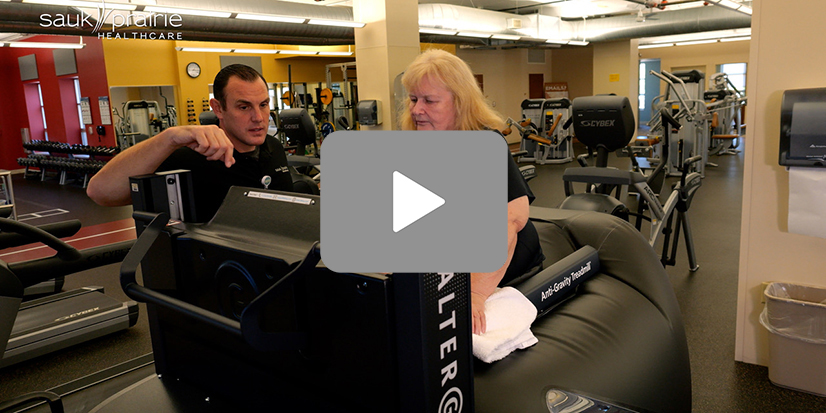 Woman walking on antigravity treadmill